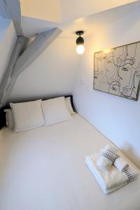 Appartements T2 au Coeur Historique de Dijon avec Clim & SmartTV : photos des chambres