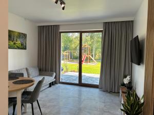 Pod Brzozami- domki całoroczne Bałtów