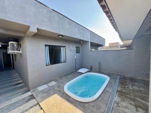 Casa com piscina - Shangri-lá