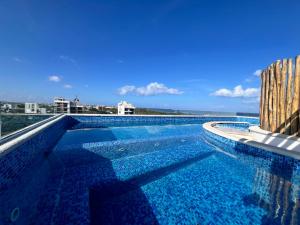 Condo Boho con Roof pool y vista al mar