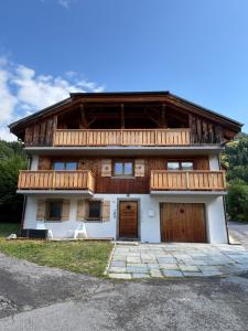 Appartements NEW Appartement COEUR DU VILLAGE : photos des chambres