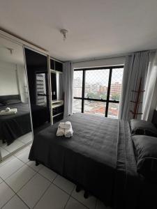 Espaçoso Quarto e sala na ponta verde