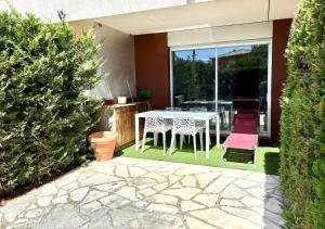 Appartements Grand studio lumineux avec jardin : photos des chambres