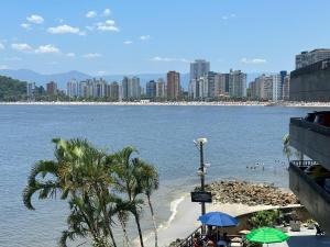 Apt pé na areia vista mar