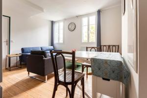 Appartements T2 Cosy proche Gare et Centre Ville - Parking Gratuit a proximite : photos des chambres