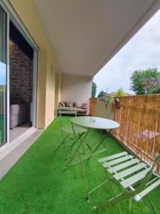 Appartements Promo 20 pourcent - centre - parking - balcon - wifi - lave linge et vaisselle : photos des chambres