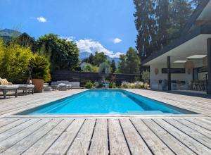 Villas Villa contemporaine avec piscine, vues panoramiques lac & montagnes, climatisation : photos des chambres
