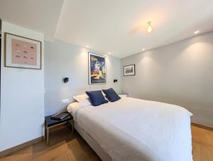 Villas Villa contemporaine avec piscine, vues panoramiques lac & montagnes, climatisation : photos des chambres