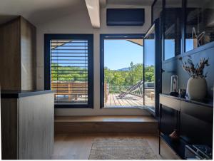 Villas Villa contemporaine avec piscine, vues panoramiques lac & montagnes, climatisation : photos des chambres