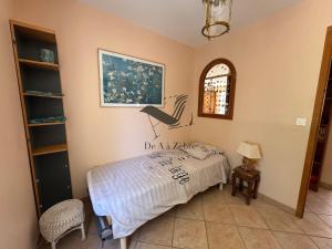 Maisons de vacances L-Amandiers en Fleurs - Situee a deux minutes des plages : photos des chambres
