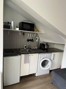 Appartements Cosy Home - Studio terrasse a 2 pas de Paris : photos des chambres
