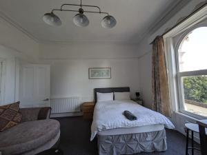 Ensuite triple room by Swansea University Hospital v