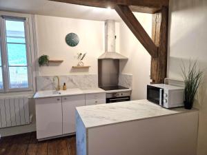 Appartements Charmant T2 avec Loggia vue montagne : photos des chambres