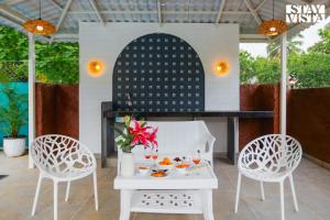 Belas Palmeiras by VEO - Part of StayVista with Pool & Bonfire