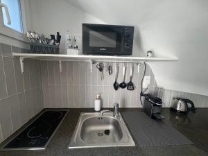 Appartements Cosy Home - Studio terrasse a 2 pas de Paris : photos des chambres