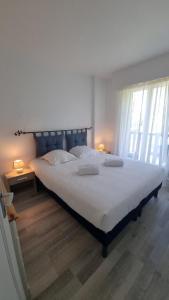 Appartements Appartement Cosy proche Plage - Balcon & Parking : photos des chambres