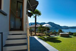 Casa 24 - Trilocale con Vista Lago, Giardino e Idromassaggio Gonfiabile