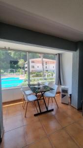 Appartements charmant appartement avec piscine : photos des chambres