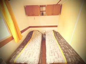 Campings Mobile home tout confort a Carcans : photos des chambres