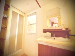 Campings Mobile home tout confort a Carcans : photos des chambres