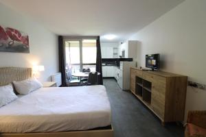 Appartements Appartement Belle etoile - Cure, ski & spa : photos des chambres