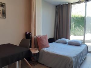 T2 Bord de mer avec jardin et piscine