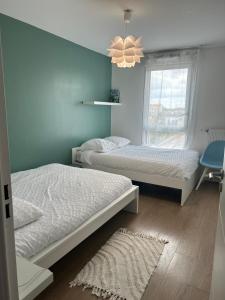Appartements Agreable 3 pieces - 8P - Parking - Sejour ideal Paris Proche Gare : photos des chambres