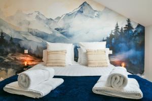 Appartements Entre Cimes Et Vignes - Clim Wifi : photos des chambres