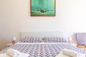 Stone house with two balconies and the sea view