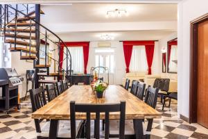 Stone house with two balconies and the sea view