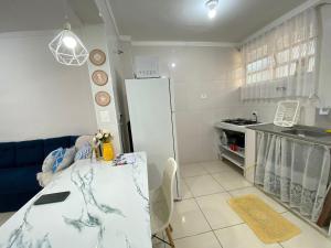 Kitnet moderna pertinho do mar com vista mar