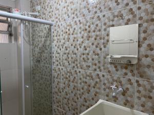 Kitnet moderna pertinho do mar com vista mar