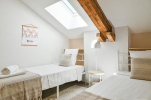 Appartements Entre Cimes Et Vignes - Clim Wifi : photos des chambres