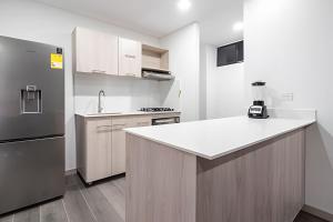 Class 48 Apt. 2302 - Íntimo loft con balcón privado