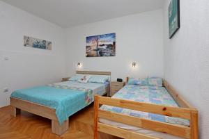 Apartments by the sea Punat, Krk - 19831