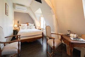 Hotels Hotel La Couleuvrine Sarlat Centre Ville : photos des chambres