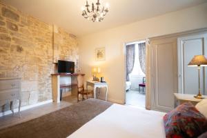 Hotels Hotel La Couleuvrine Sarlat Centre Ville : photos des chambres