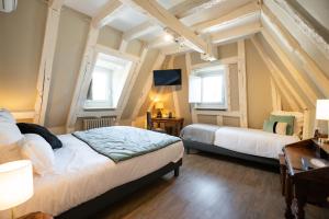 Hotels Hotel La Couleuvrine Sarlat Centre Ville : photos des chambres