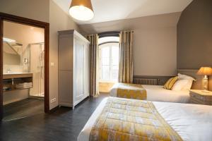 Hotels Hotel La Couleuvrine Sarlat Centre Ville : photos des chambres