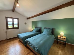 Maisons de vacances Maison de montagne avec SPA, cheminee et activites proche voisins - FR-1-489-534 : photos des chambres