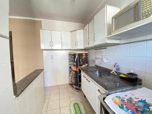 Apto c vista mar e piscina no prédio perto do mar