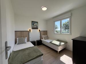 Maisons de vacances Gite moderne a Marcillat-en-Combraille, nature et confort pour 4 personnes - FR-1-489-582 : photos des chambres