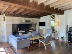 Maisons de vacances Ferme renovee avec charme, 4 chambres, grand jardin prive, cheminee, proche nature a Gouise ! - FR-1-489-374 : photos des chambres