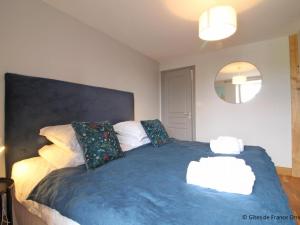 Maisons de vacances Maison normande renovee avec grand jardin, ideale pour famille, proche lac et randonnees - FR-1-497-143 : photos des chambres