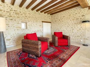 Maisons de vacances Charmante maison en pierres avec jardin, proche de Mortagne-au-Perche - FR-1-497-241 : photos des chambres
