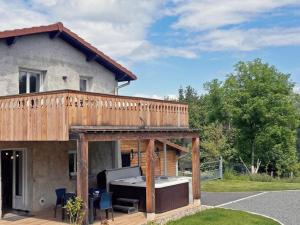 Maisons de vacances Gite de charme avec spa, terrasse et balcon - Tout confort, au coeur de la nature - FR-1-496-303 : photos des chambres