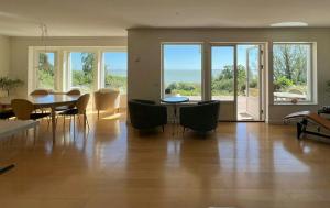 Swedish Timber House Overlooking Lake Arresø