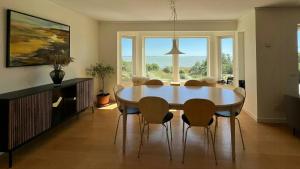 Swedish Timber House Overlooking Lake Arresø