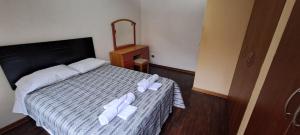 Dormitorio con baño compartido a 25 minutos del Apto