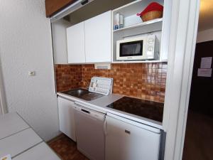 Appartements Studio renove skis aux pieds avec parking - 4 pers - FR-1-445-95 : photos des chambres